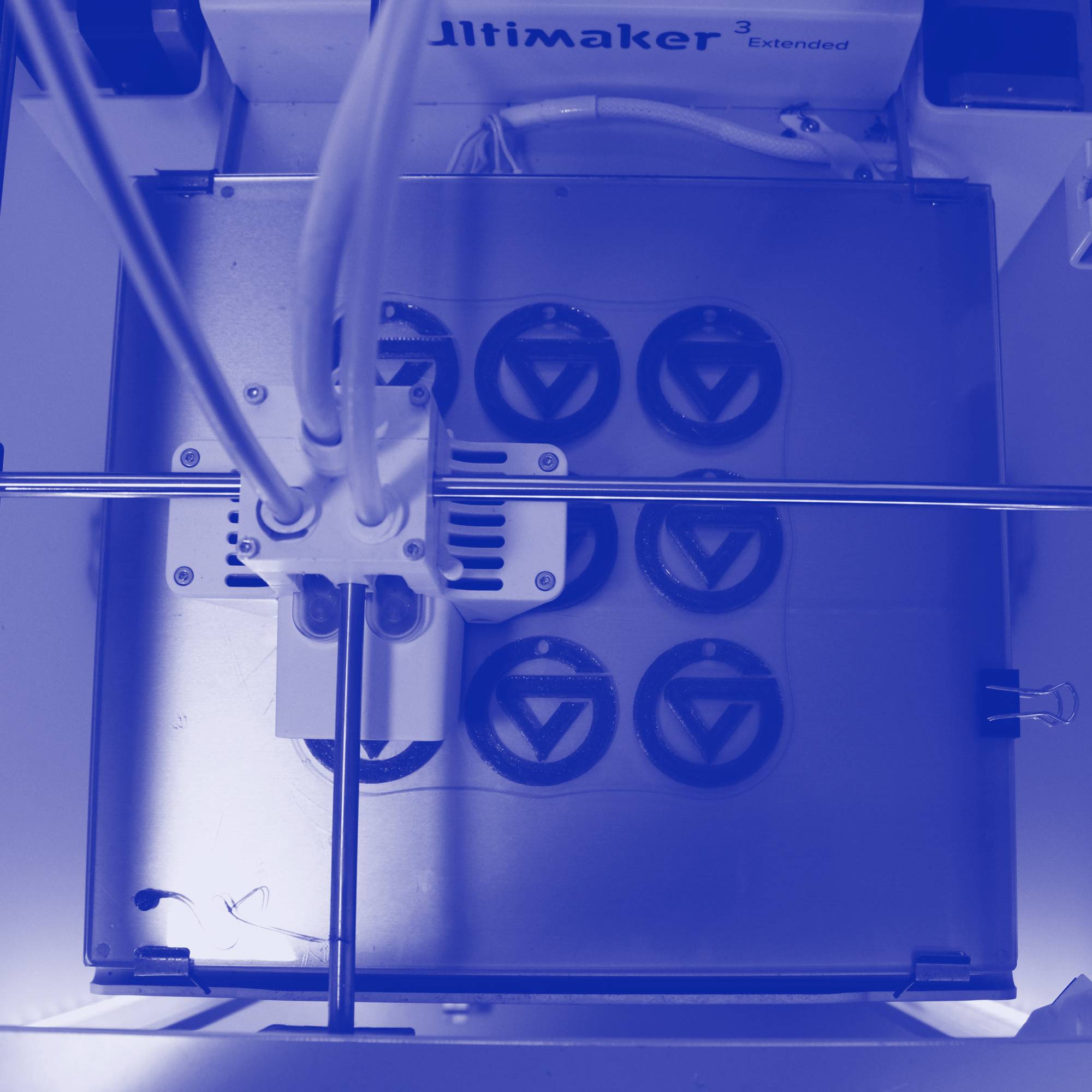 A 3D printer printing GVSU logos